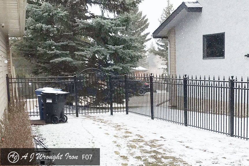 short black wrought iron picket fence