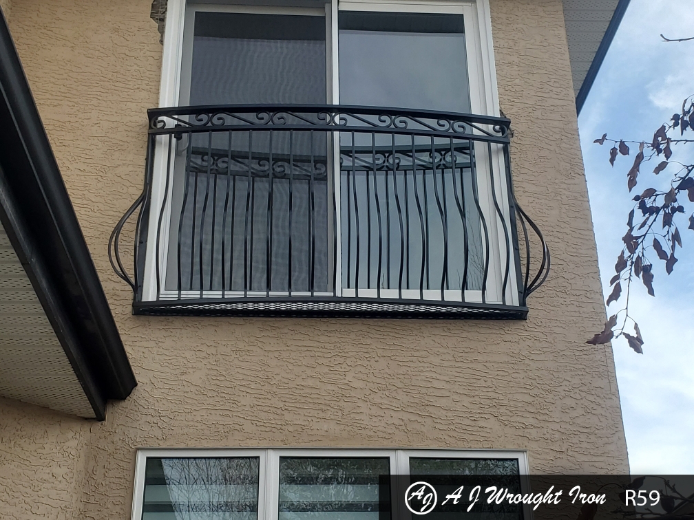 black wrought iron Juliet Balcony Railing on stucco house