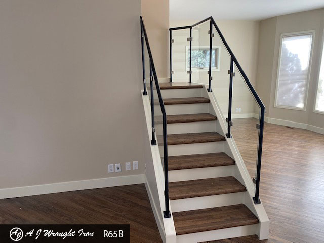 modern glass and metal stair railing in new home