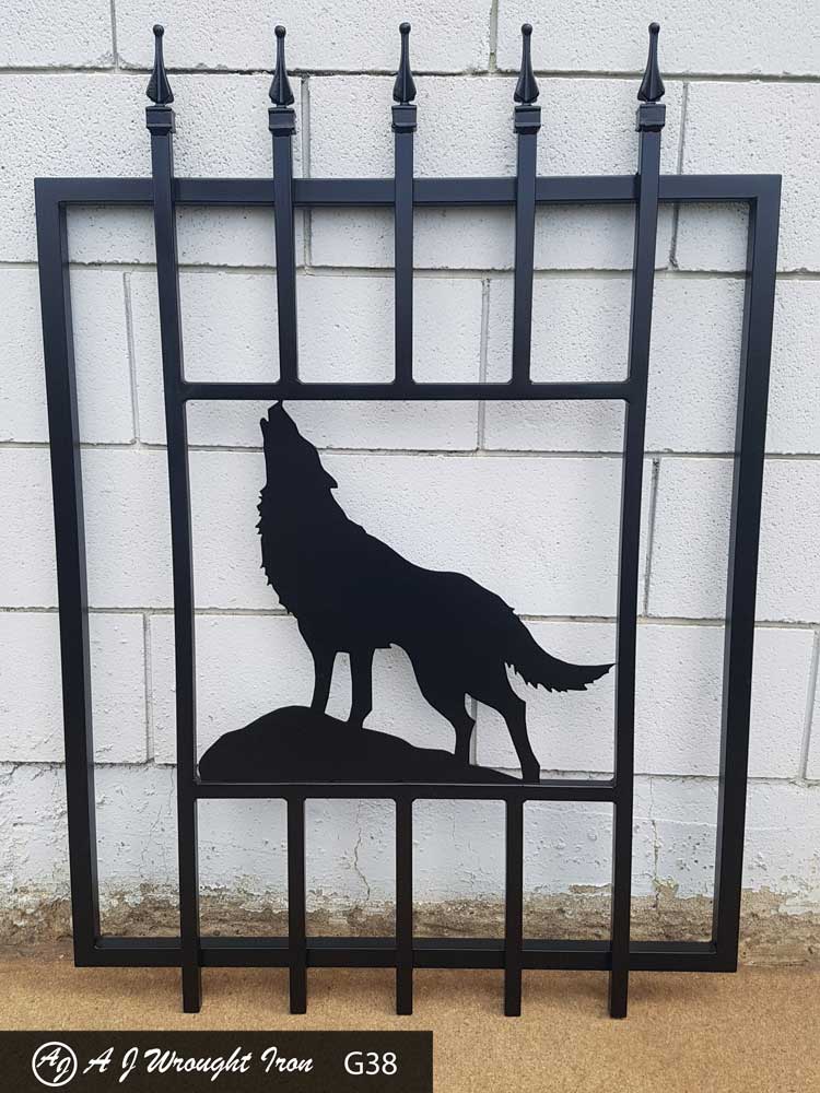 iron gate with plasma cut wolf silhouette