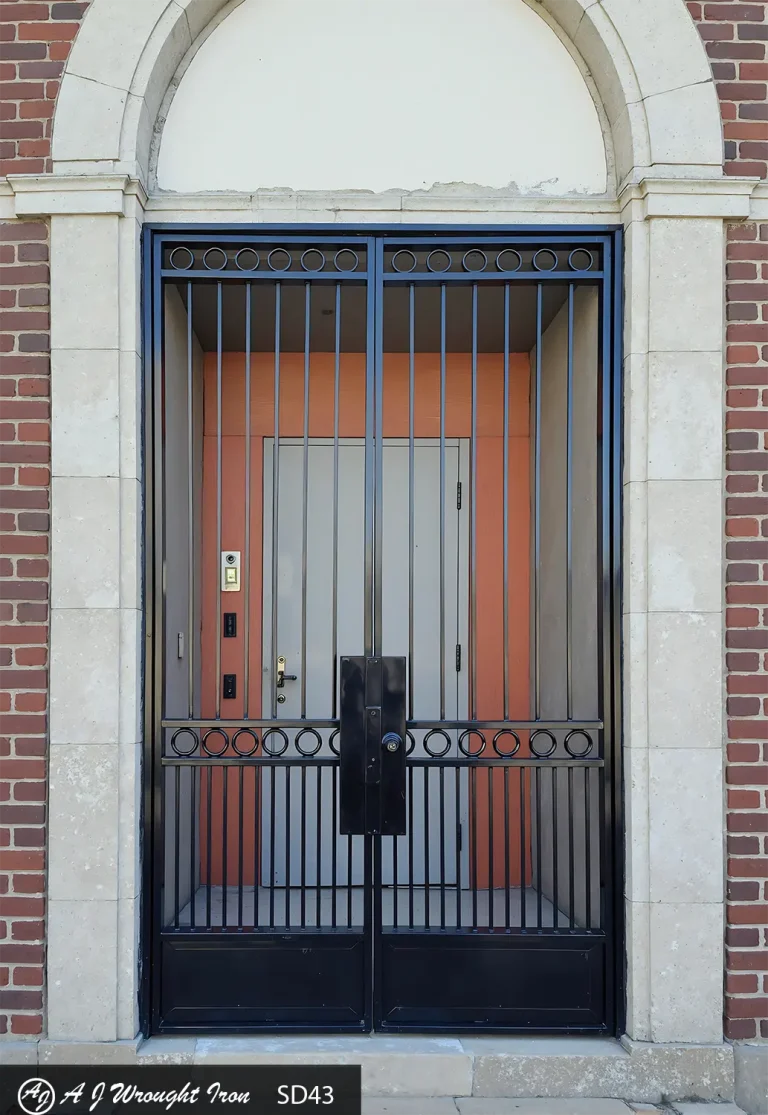 black double door security gate made of black wrought iron